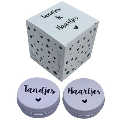 Doodje tanden en haartjes wit en zwart